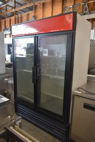 True GDM-49 ENERGY STAR Metal Commercial 2 Door Reach In Cooler Merchandiser w/ Poly Coated Racks. 115 Volts, 1 Phase. Tested and Powers On But Does Not Get Cold