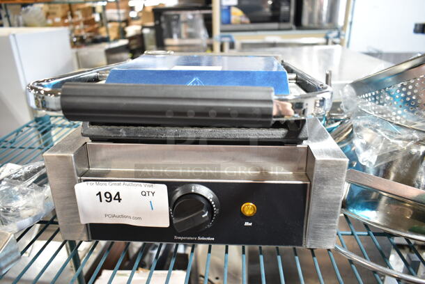 BRAND NEW SCRATCH AND DENT! 2023 Galaxy 177P65SG Stainless Steel Commercial Countertop Single Panini Sandwich Grill with Grooved Top and Smooth Bottom Plates - 8 1/2" x 8 1/2" Cooking Surface. 120 Volts, 1 Phase. Tested and Working! - Image 4 of 6