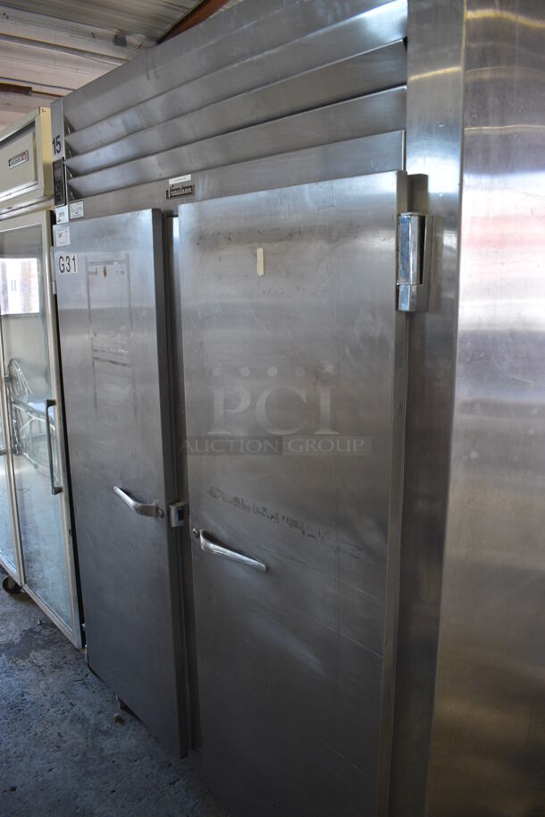 Traulsen Model RHT 2-32 WUT Stainless Steel Commercial 2 Door Reach In Cooler w/ Metal Oven Racks. 115 Volts, 1 Phase. 58x36x83.5. Tested and Working!