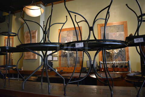 4 Metal Mesh Round Outdoor Patio Tables. BUYER MUST REMOVE. 42x42x27, 36x36x29. 4 Times Your Bid! (Susquehanna Ale House)