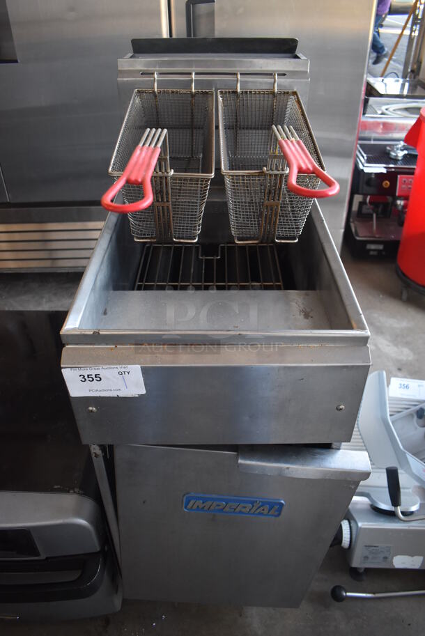 Imperial Stainless Steel Commercial Floor Style Natural Gas Powered Deep Fat Fryer w/ 2 Metal Baskets on Commercial Casters. 15.5x31x46