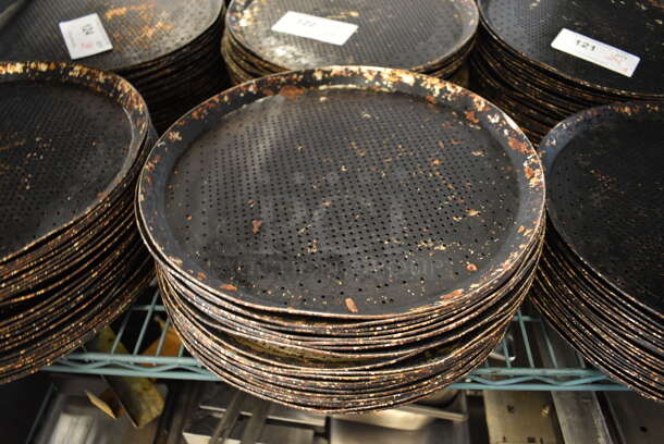 24 Metal Perforated Round Baking Sheets. 13.25x13.25x1. 24 Times Your Bid!