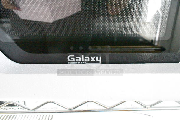BRAND NEW SCRATCH AND DENT! 2024 Galaxy 177MW900D0A Office Series Microwave with Push Button Controls. 120 Volts, 1 Phase.  - Image 3 of 5