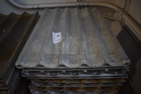 18 Metal Perforated 5 Loaf Baking Pans. 18x26x1. 18 Times Your Bid!