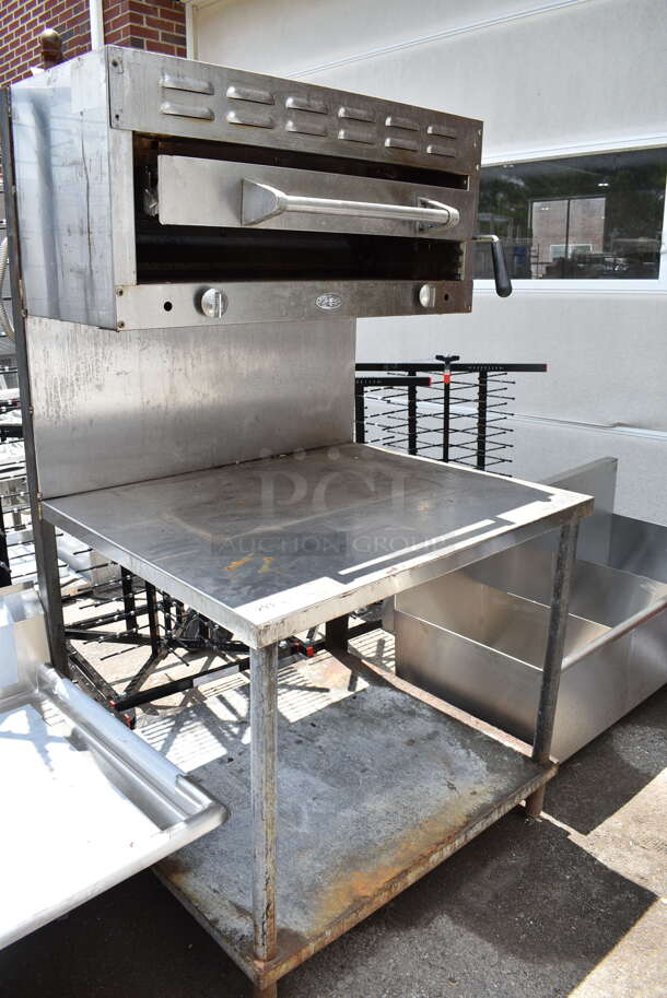 DCS Stainless Steel Commercial Natural Gas Powered Cheese Melter on Table w/ Under Shelf.  - Image 1 of 6