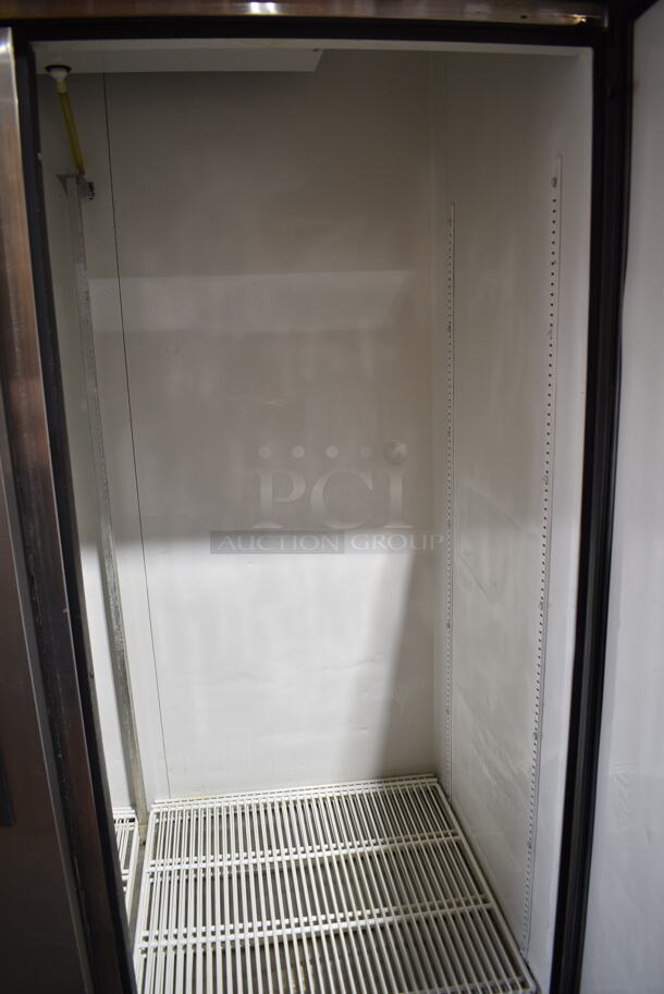 True T-49 ENERGY STAR Stainless Steel Commercial 2 Door Reach In Cooler on Commercial Casters. 115 Volts, 1 Phase. Tested and Working! - Image 4 of 6
