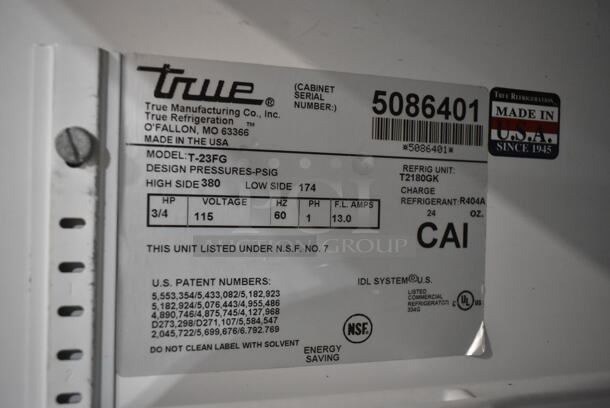 True T-23FG Stainless Steel Commercial Single Door Reach In Cooler Merchandiser w/ Poly Coated Racks on Commercial Casters. 115 Volts, 1 Phase. Tested and Powers On But Does Not Get Cold - Image 4 of 4