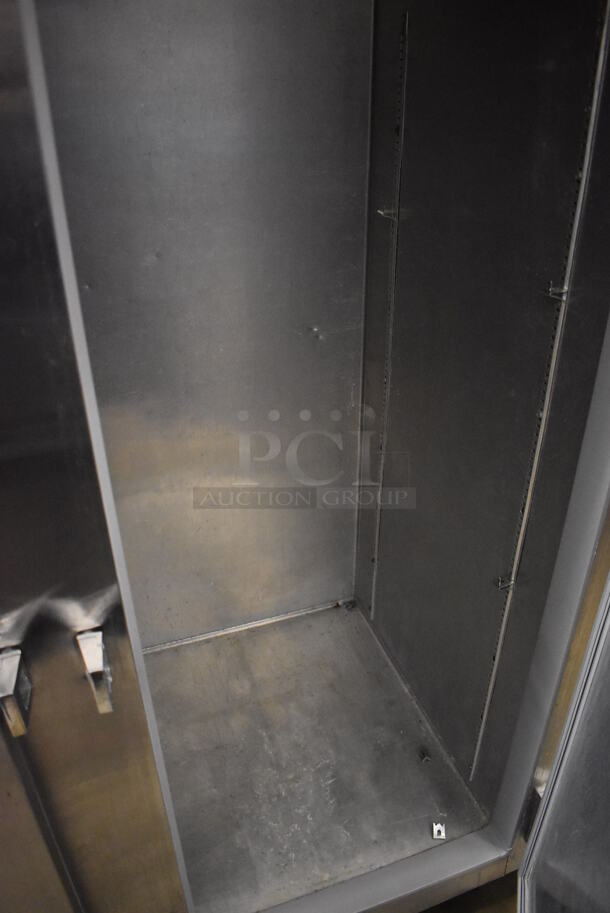 Continental 2RE Stainless Steel Commercial 2 Door Reach In Cooler on Commercial Casters. 115 Volts, 1 Phase. 57x34x82. Tested and Working! - Image 4 of 5