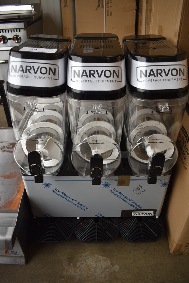BRAND NEW! Narvon Model 378SM3 Metal Commercial Countertop 3 Hopper Slushie Machine. Each Hopper Has 3 Gallon Capacity. 120 Volts, 1 Phase. 24x20x29. Tested and Working!