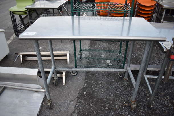 Stainless Steel Commercial Table on Commercial Casters. 48x24x40 - Image 1 of 4