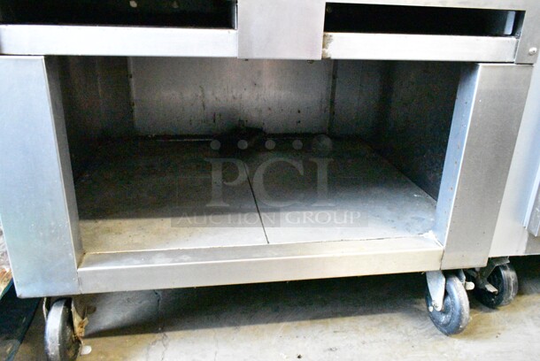 Vulcan Stainless Steel Commercial Natural Gas Powered Charbroiler Grill on Commercial Casters.  - Image 4 of 7