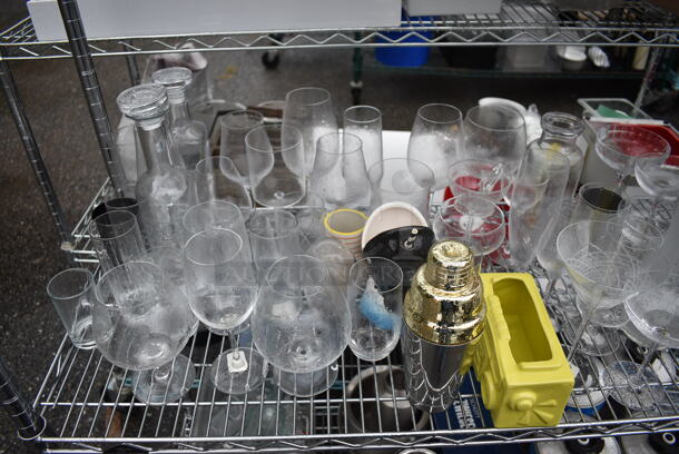 ALL ONE MONEY! Lot of Chrome Finish 4 Tier Shelving Unit on Commercial Casters w/ All Contents Including Glassware, Ceramic Plates, Metal Ice Bucket. DISMANTLE FOR SHIPPING. PLEASE CONSIDER FREIGHT CHARGES. 60x18x79 - Image 5 of 8