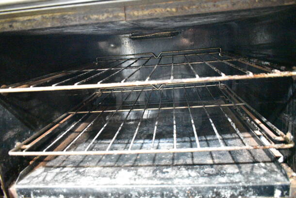 Southbend 460 Stainless Steel Commercial Natural Gas Powered 10 Burner Range w/ 2 Ovens, Over Shelf and Back Splash on Commercial Casters.  - Image 5 of 7
