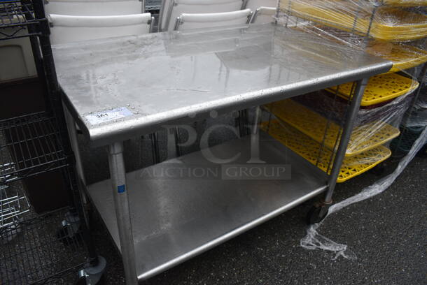 Stainless Steel Table w/ Under Shelf on Commercial Casters. 48x30x36