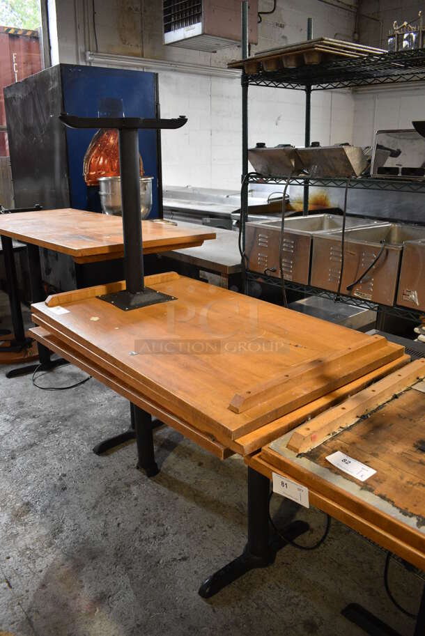 3 Wooden Tabletops; 1 w/ 1 Black Metal Table Base and 1 w/ 2 Metal Table Bases. 48x30x30, 48x30x1.5. 3 Times Your Bid!
