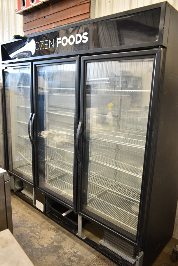 2016 True GDM-72F-HC Metal Commercial 3 Door Reach In Freezer Merchandiser w/ Poly Coated Racks. 115/208-230 Volts, 1 Phase.  - Image 1 of 7