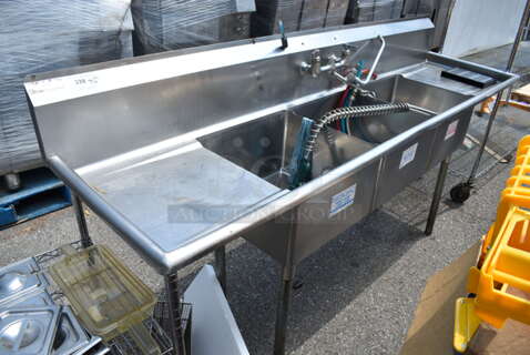 Stainless Steel Commercial 3 Bay Sink w/ Dual Drain Boards, Faucet, Handles and Spray Nozzle Attachment. 