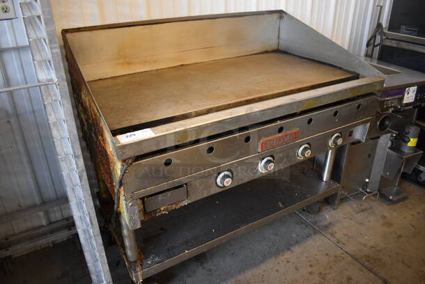 Vulcan Stainless Steel Commercial Natural Gas Powered Flat Top Griddle w/ Thermostatic Controls and Metal Under Shelf on Commercial Casters. 48x31x45.5 - Image 3 of 6