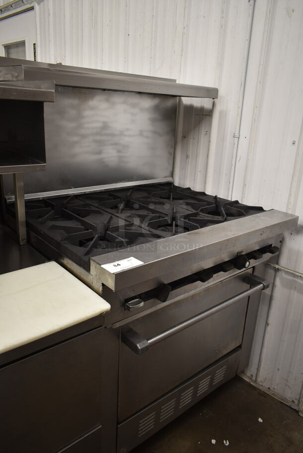 Garland SunFire SX-6-26 Stainless Steel Commercial Natural Gas Powered 6 Burner Range w/ Oven, Over Shelf and Back Splash.  - Image 1 of 7