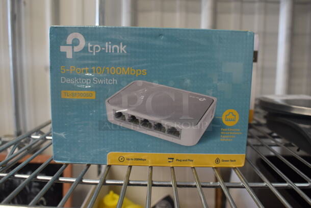 4 BRAND NEW IN BOX TP-Link 5 Port Switch TL-SF1005D and 1 Netgear ProSafe 16 Port Switch FS116. 5 Times Your Bid! - Image 1 of 5