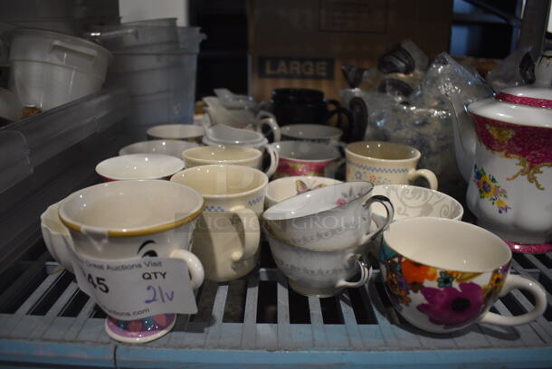 21 Various White Ceramic Mugs. Includes 5x3.5x2.5. 21 Times Your Bid! - Image 1 of 4