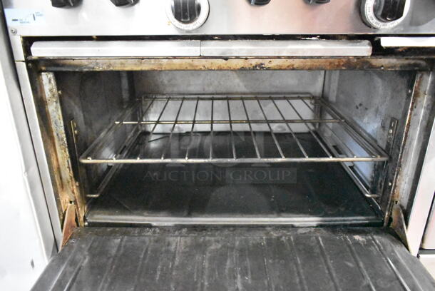 Garland X60-6R24RR Stainless Steel Commercial Propane Gas Powered 6 Burner Range w/ Right Side Flat Top Griddle and 2 Ovens. - Image 6 of 11