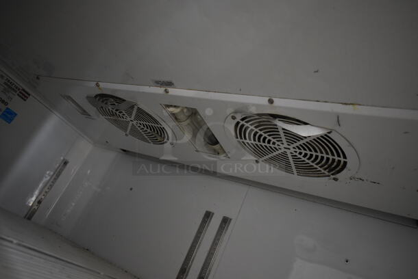 2013 True TG2R-2S ENERGY STAR Stainless Steel Commercial 2 Door Reach In Cooler w/ Poly Coated Racks on Commercial Casters. 115 Volts, 1 Phase. Tested and Working! - Image 6 of 8