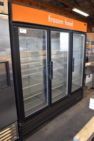 2012 True GDM-72F Metal Commercial 3 Door Reach In Freezer Merchandiser w/ Poly Coated Racks. 115/208-230 Volts, 1 Phase. 78x31.5x80