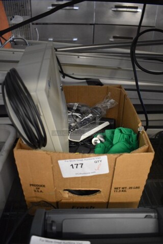 ALL ONE MONEY! Lot of Various Items Including a Security Tronix Box, Remote Controls and Green T-Shirt.