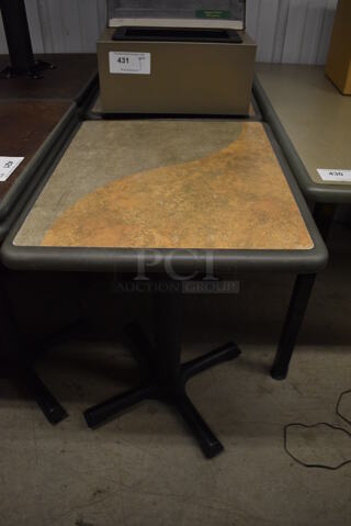 Tan and Gray Green Dining Table on Black Metal Table Base. Stock Picture - Cosmetic Condition May Vary. 24x20x30