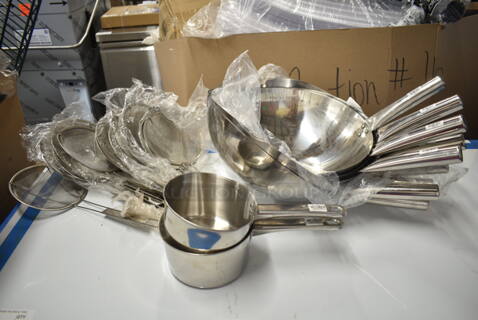 30 BRAND NEW SCRATCH AND DENT!  Items; 10 14" Wok, 2 1.5 Quart Sauce Pan, 18 Thunder Group 6.5" Round Skimmer. 30 Times Your Bid!