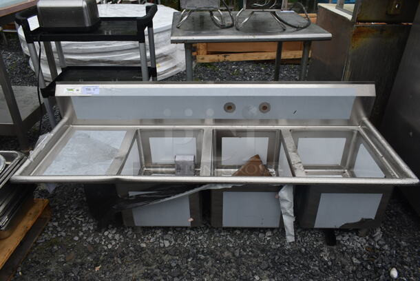 BRAND NEW SCRATCH AND DENT! Regency 600S3162018LFT Stainless Steel Commercial 3 Bay Sink w/ Left Side Drain Board and Legs. Bays 16x20. Drain Boards 16x22 - Image 1 of 5