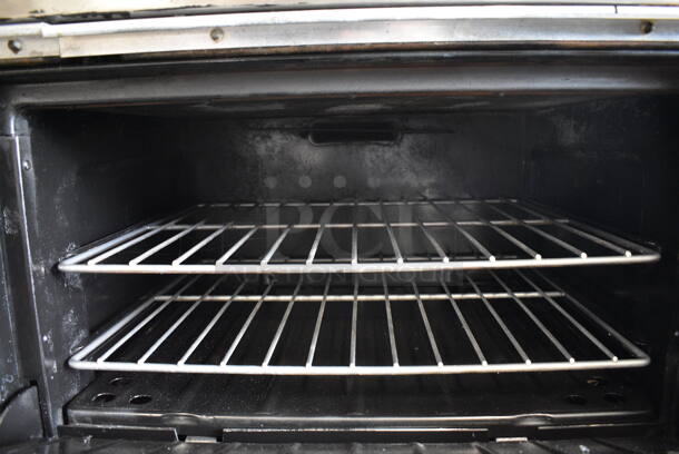 Garland Metal Commercial Natural Gas Powered 10 Burner Range w/ 2 Ovens, Over Shelf and Back Splash. 60x31x58 - Image 7 of 8