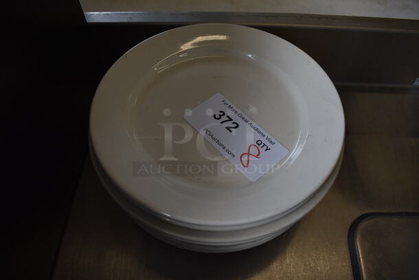 8 White Ceramic Plates. 10x10x1. 8 Times Your Bid!