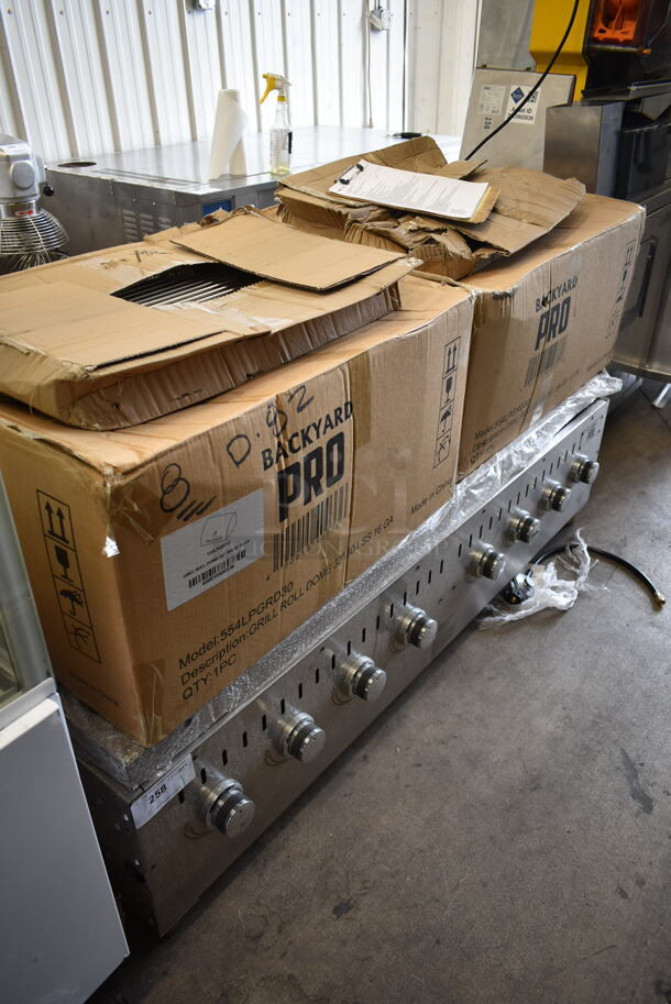 BRAND NEW SCRATCH AND DENT! 2022 Backyard Pro LPG60RD 60" Stainless Steel Liquid Propane Outdoor Grill With 2 Roll Dome Lids. Stock Picture Used as Gallery Picture. - Image 3 of 12