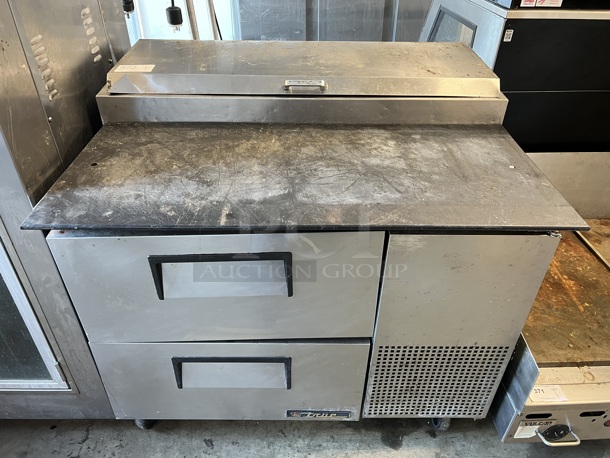 True Stainless Steel Commercial Pizza Prep Table w/ 2 Drawers on Commercial Casters. 115 Volts, 1 Phase. 45x33x42. Tested and Working!