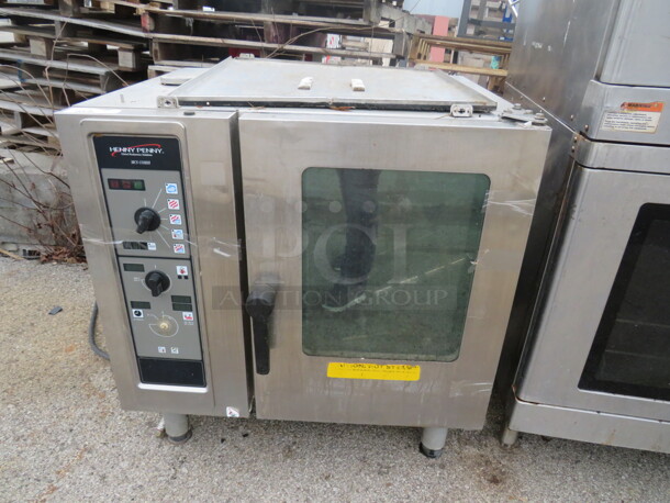 One Henny Penny Electric Combi Oven. 208/240 Volt. 3 Phase. Model# MCS6. 35X31X38  - Image 1 of 1