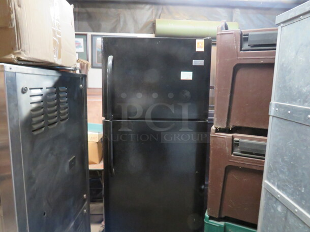 One Frigidaire Refrigerator/Freezer. Model# FFTR2021QB4. 