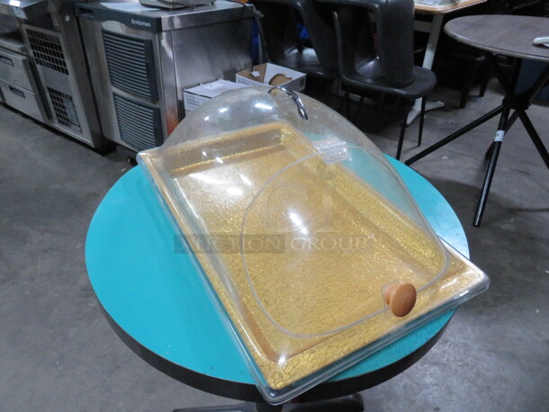 One Bakery Tray With Dome Lid With Sef Serve Flip Lid. 