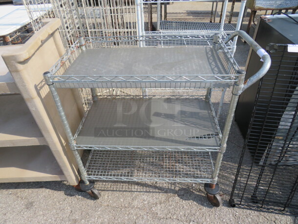 One Metro 3 Shelf Cart On Casters. 34X18X35 - Image 1 of 1