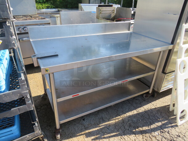 One Stainless Steel Table With 2 Stainless Steel Under Shelves, Back Splash, And A 10lb Can Opener, On Casters. 60X32X39 - Image 3 of 3