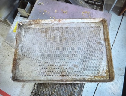 One Full Size Perforated Sheet Pan.