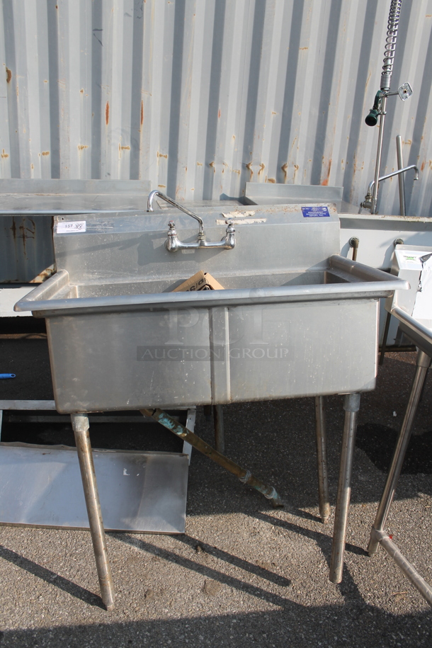 Stainless Steel Commercial 2 Bay Sink w/ Faucet and Handles. Missing 1 Leg. - Image 1 of 3