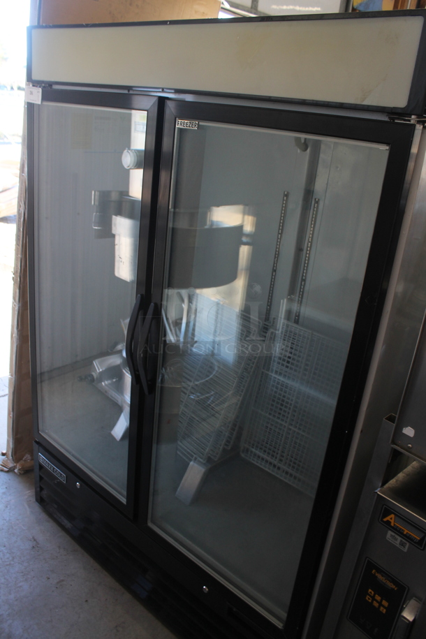 Maxx Cold MXM2-48F Metal Commercial 2 Door Reach In Freezer Merchandiser w/ Poly Coated Racks. 115/230 Volts, 1 Phase.