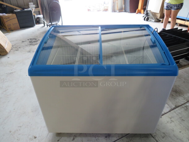 One Ice Cream Merchandising Freezer On Casters. Model# RDS100F. 39X26X34 - Image 1 of 3