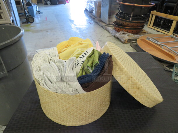 One Round Wicker Hat Box Full Of Assorted Cloth Napkins.