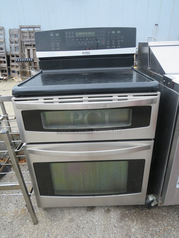 One Kenmore Household Range. Top Burners Do Not Work. Oven Works Great. 30X27X47 - Image 1 of 1