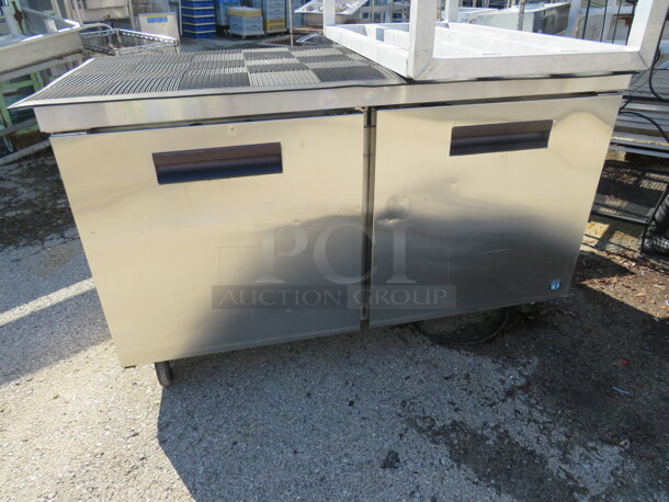 One WORKING Stainless 2 Door Hoshizaki Worktop Refrigerator, With 2 Racks,  On Casters. Model# CRMR60. 115 Volt. 60X30X36. $6750.00 - Image 1 of 2