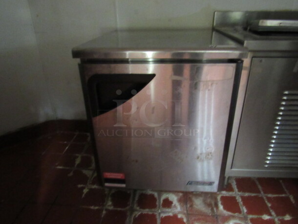 BUYER MUST REMOVE! One Stainless 1 Door Turbo Air Under Counter Refrigerator With 1 Rack On Casters. Model# TUR28SD. 115 Volt. 27.5X30X36