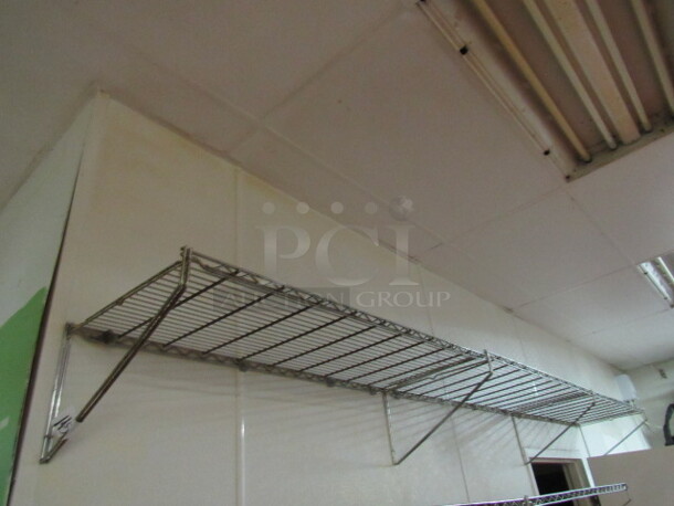 One Wall Mount Wire Shelving System. 144X18. BUYER MUST REMOVE